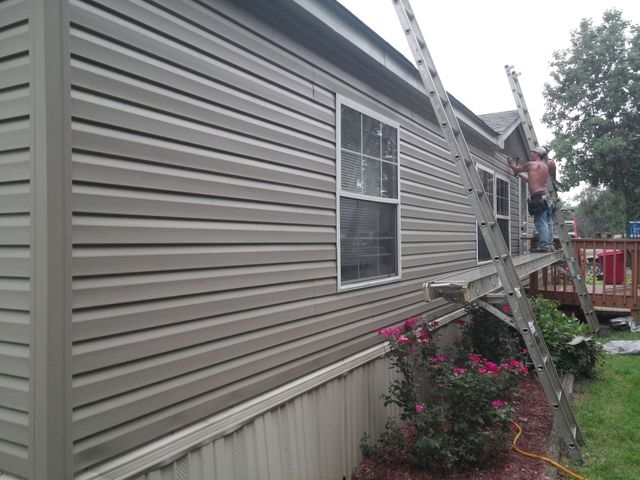 Mobile Home Siding Repair: Beige Horizontal Lap Panels.