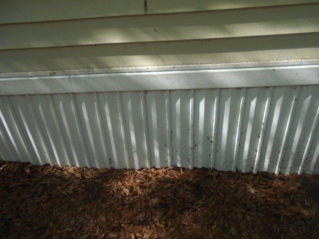Mobile Home Skirting with Vertical Corrugation and White Trim
