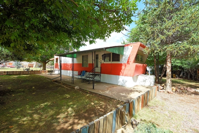 Mobile Home Slanted Roofline Mid-Century Orange and White Stripes
