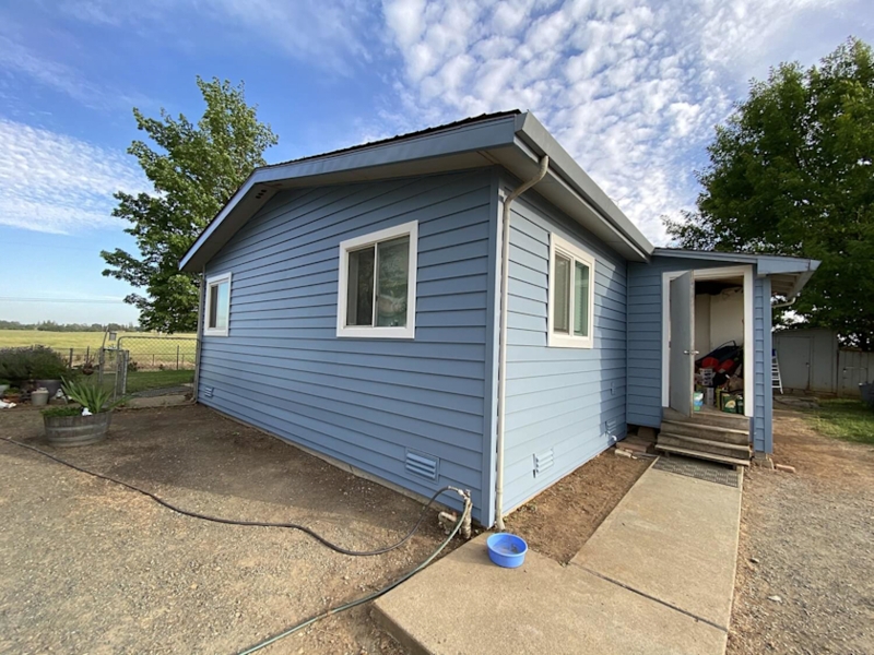 Mobile Home: Slate Blue Horizontal Siding, White Trim