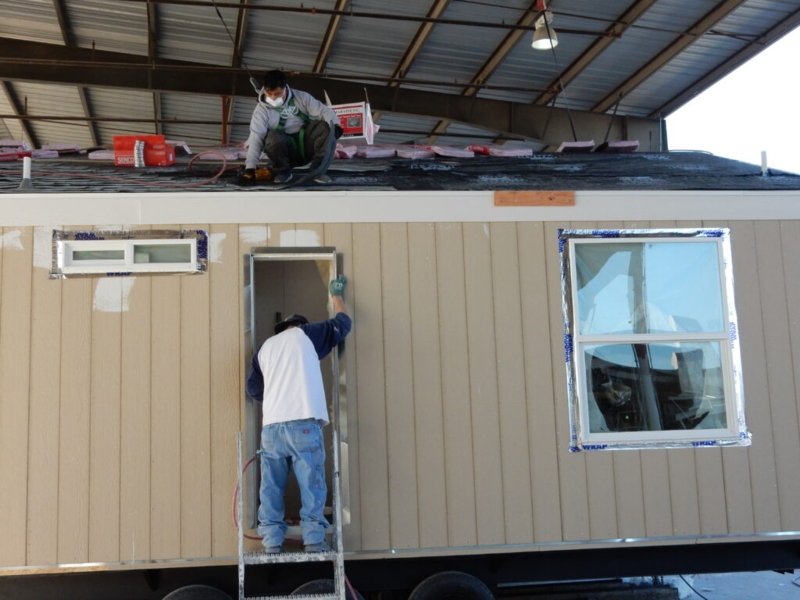 Mobile Home Window Installation with Vertical Siding and New Frames