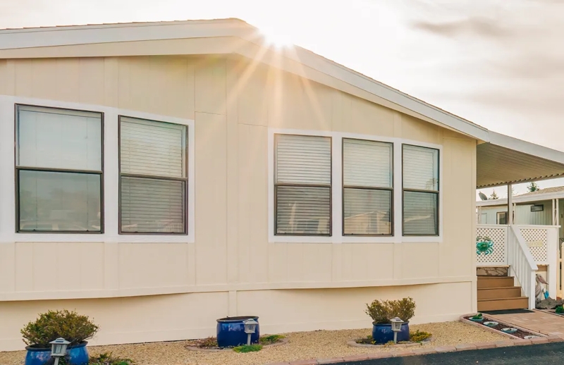 Mobile Home Windows White Trim Exterior with Beige Siding and Blinds