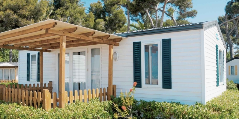 Mobile Home Wooden Patio Cover Overhang With Dark Teal Shutters
