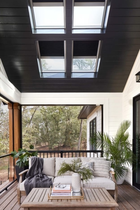 Modern Black Planked Ceiling Porch with Integrated Skylights