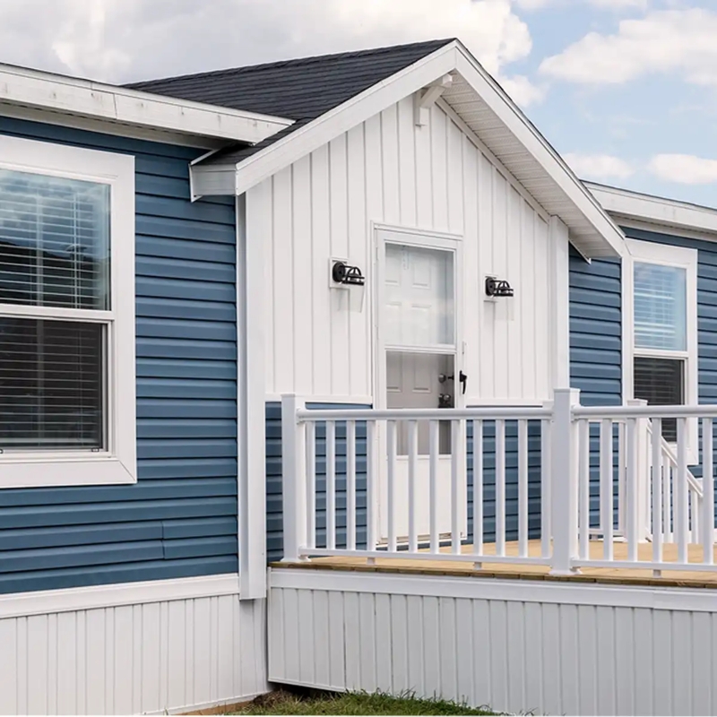 Modern Exterior Door with Navy Blue Siding and Gabled Entryway Idea