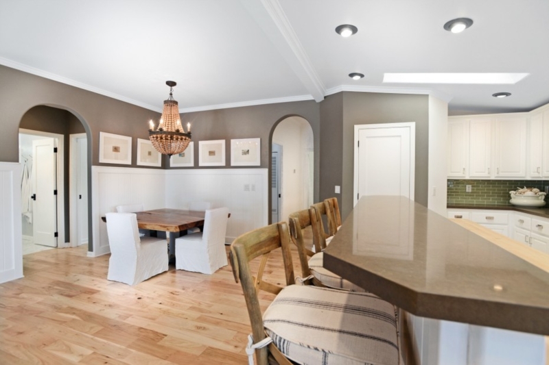 Modern Farmhouse Dining Room with Beaded Chandelier, Live Edge Table