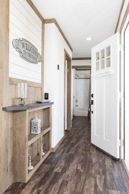 Modern Farmhouse Entryway with Built-In Shelf and Vinyl Plank Flooring