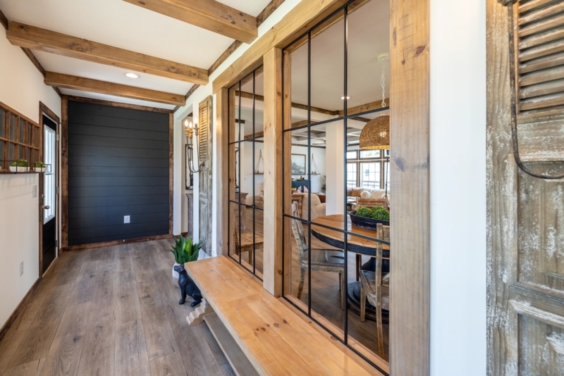 Modern Farmhouse Foyer: Black Shiplap Wall, Wood Beams, & Glass Partition