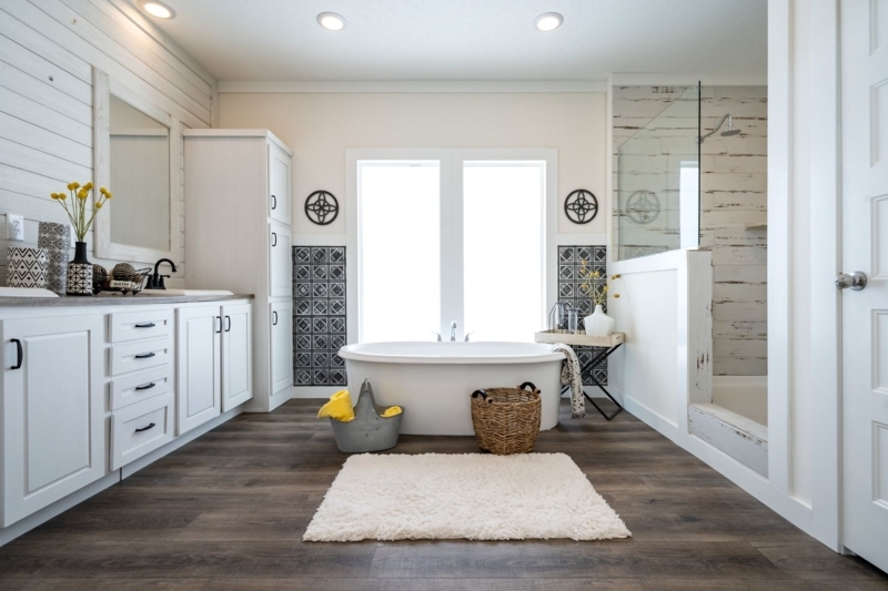 Modern Farmhouse Layout with Patterned Tile Accents and Freestanding Tub