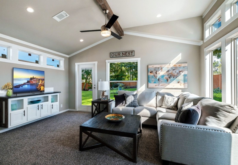 Modern Farmhouse Living Room Layout with Vaulted Ceiling Beam