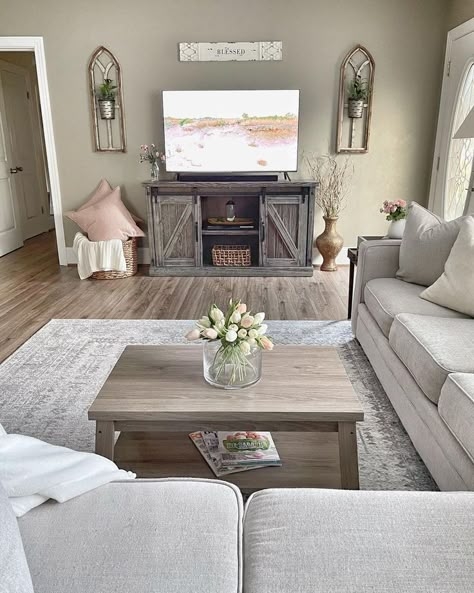 Modern Farmhouse Living with Barn Door Console and Arched Wall Decor