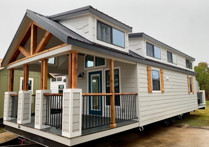 Modern Farmhouse Tiny House with Exposed Wood Trusses