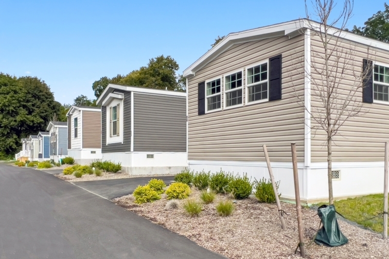 Modern Manufactured Home Curb Appeal: Neutral Siding, Window Shutters