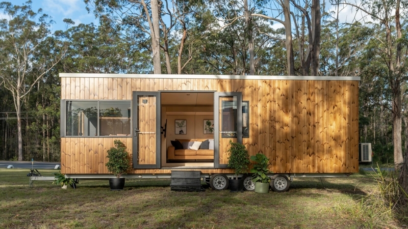 Modern Tiny House Exterior with Vertical Wood and Indoor Outdoor Flow