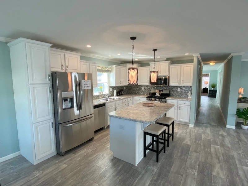 Modern U-Shaped Kitchen Layout: White Shaker Cabinets & Cage Pendants