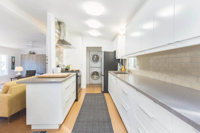 Modern White Galley Kitchen Layout with Grey Counters and Runner Rug