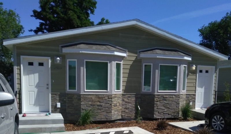 Modular Home Stone Veneer Wainscoting with Twin Bay Windows, Sage Green