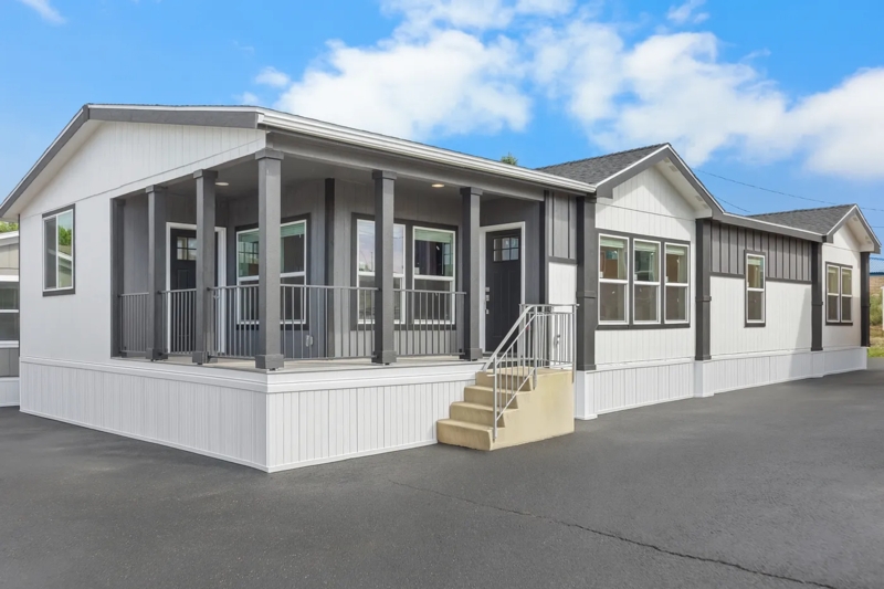 Modular Home White Siding Charcoal Gray Trim Integrated Porch