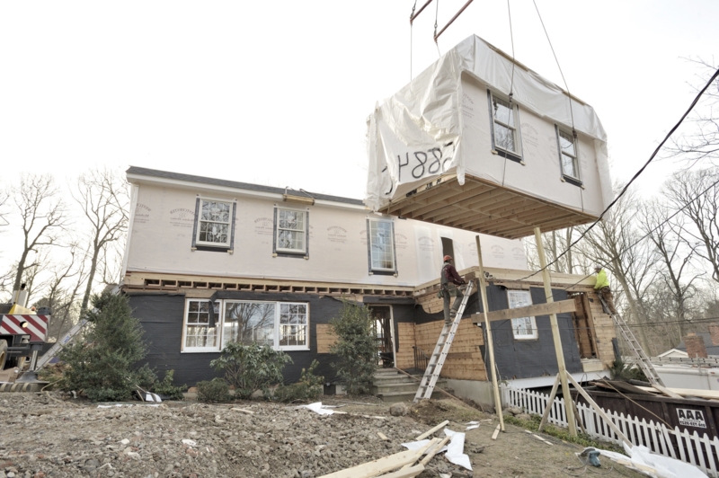 Modular House Addition Construction: Crane Lifted Pre-Fabricated Unit