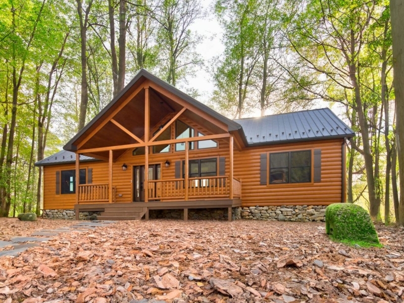 Modular Log Home with Prominent Gabled Entryway