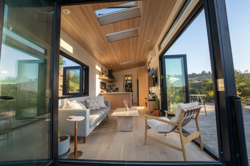 Multiple Skylights: Light Wood Plank Ceiling Tiny House
