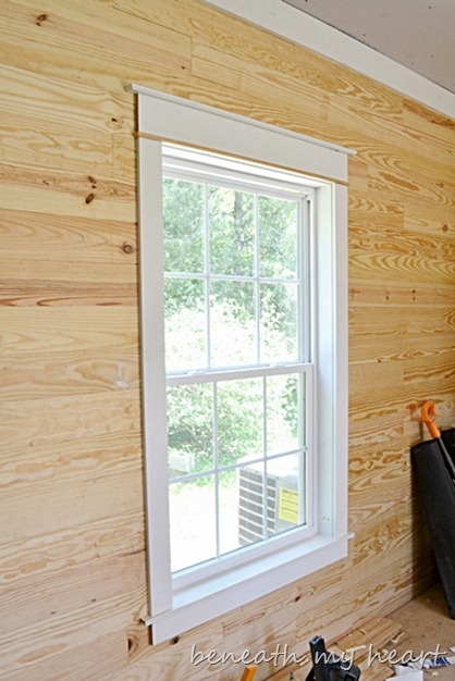 Natural Wood Plank Walls with White Trim Contrast