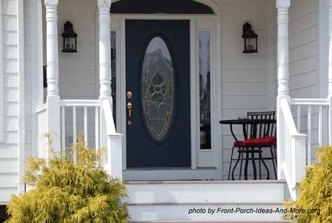 Navy Blue Front Door with Oval Glass Insert on Porch with Bistro Set