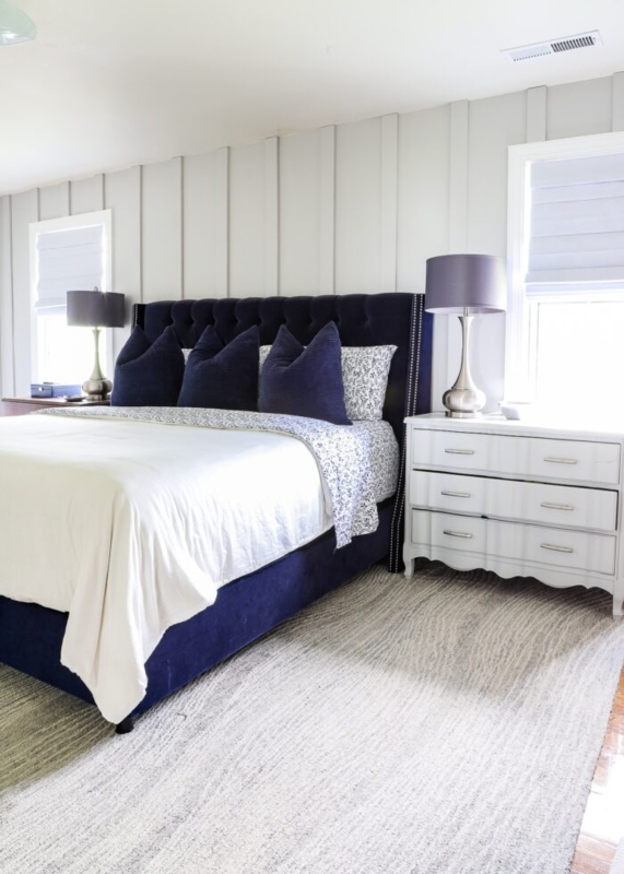 Navy Velvet Upholstered Bed with Tufted Wingback Silhouette in Grey Bedroom
