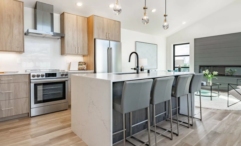 One-Wall Kitchen Ideas: Waterfall Edge Island with Grey Stools