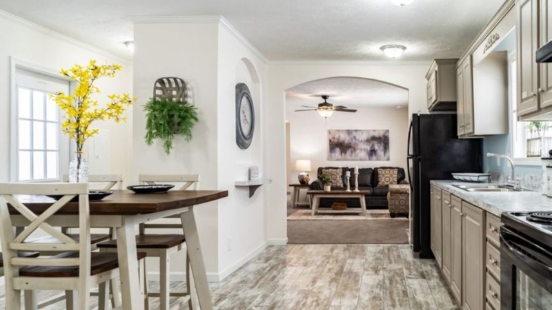 Open Concept Dining: Arched Transition & Weathered Plank Floors
