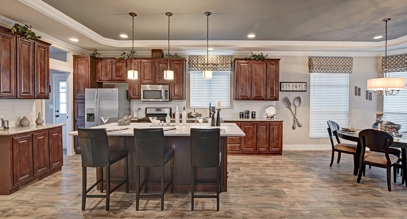 Open Concept Kitchen with Dark Wood Cabinetry and Island Seating