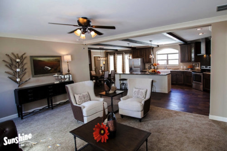 Open Concept Living Room Layout with Dark Exposed Ceiling Beams