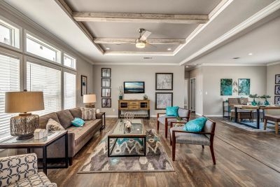 Open Concept Living Room Tray Ceiling Beams Turquoise Accents Gray