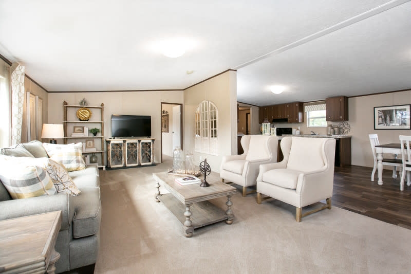 Open Concept Living Room with Wingback Accent Chairs