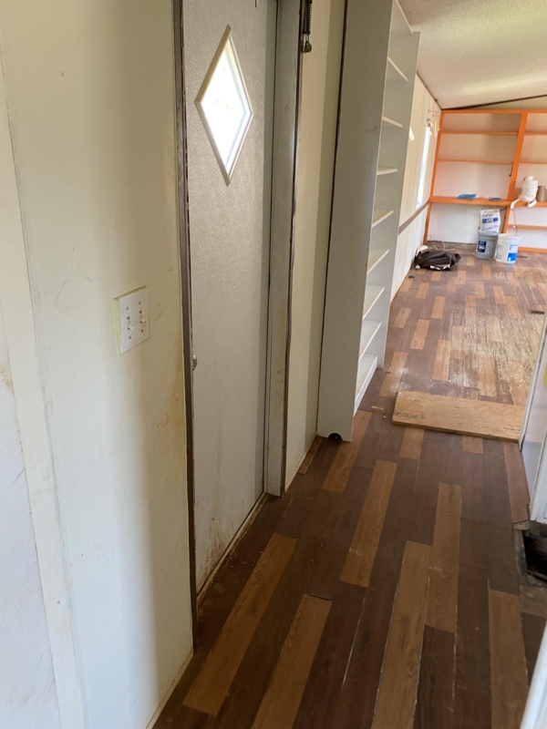 Open Concept Remodel Forest Green Accent Wall Butcher Block Island