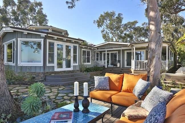 Orange Outdoor Sectional Sofa on Flagstone Patio with Blue Tiled Table