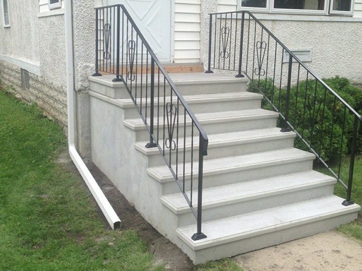 Outdoor Stairs, Bullnose Edges with Decorative Metal Scrollwork.