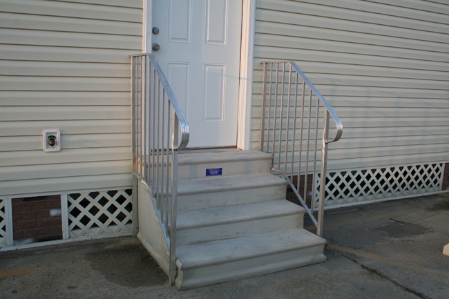 Outdoor Steps, Metal Handrails with Four-Step Design for Precast Entry.