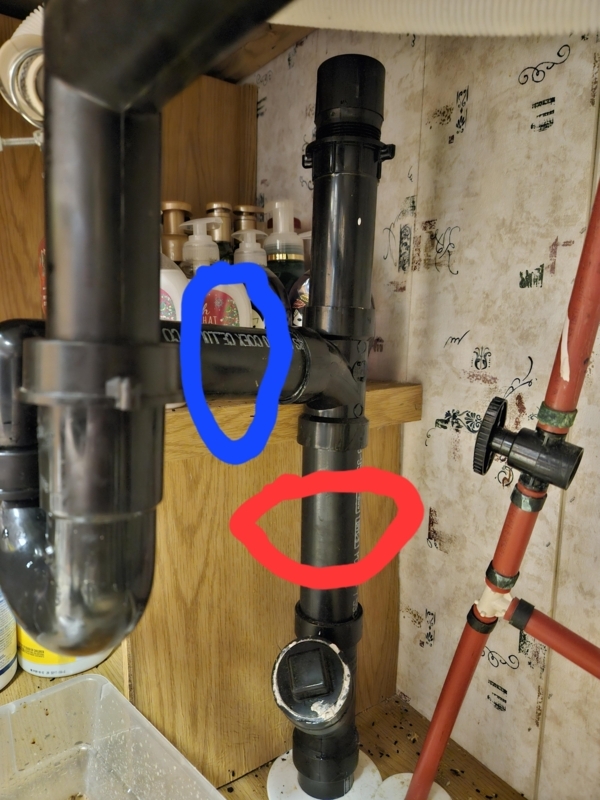 Plumbing Assembly: Compact Black ABS Drain Layout under Kitchen Sink