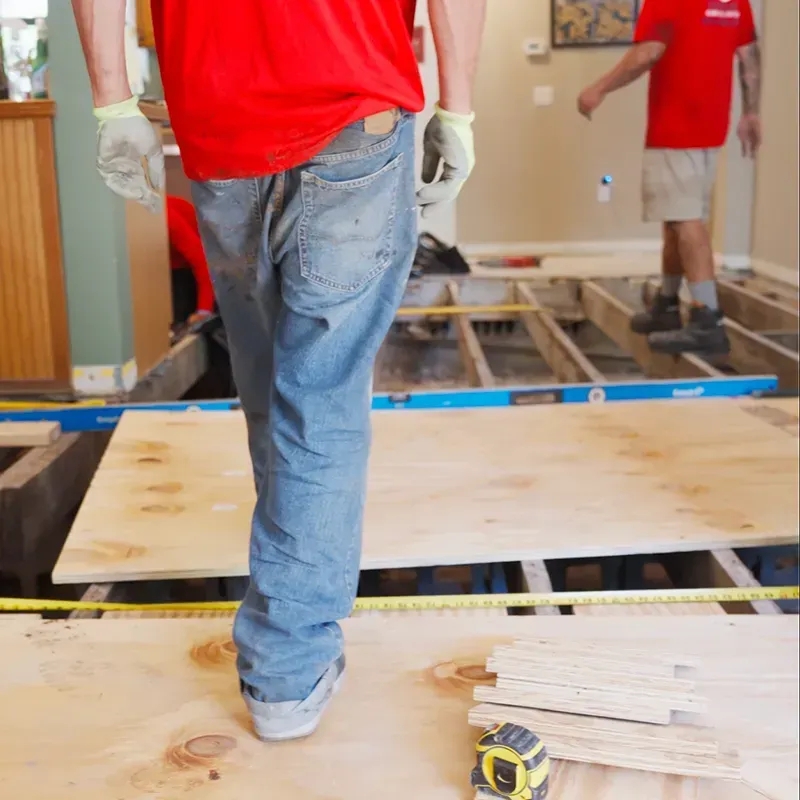 Plywood Subfloor Installation Process: Mobile Home with Exposed Joists