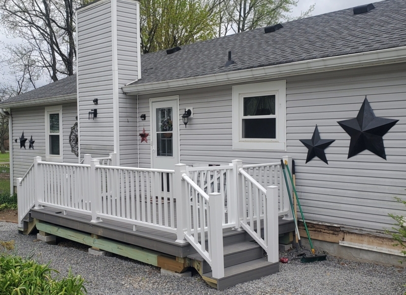 Raised Deck with White Vinyl Railing & Grey Composite