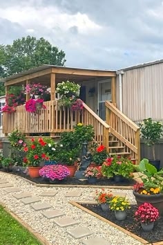 Raised Wooden Porch with Gravel Path & Stepping Stones