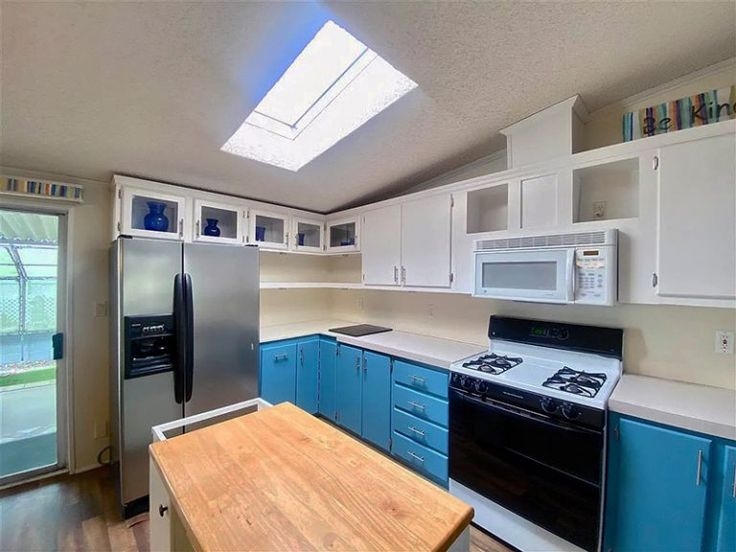 Rectangular Kitchen Skylight: Two-Tone Blue & White Cabinets