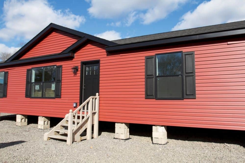 Red Manufactured Home Exterior on Concrete Block Pier Foundation