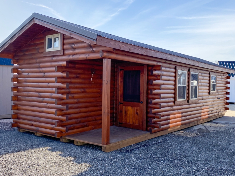 Reddish Brown Log Cabin Exterior Design with Corner Notches