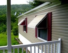 Ribbed Metal Window Awning with Burgundy Trim