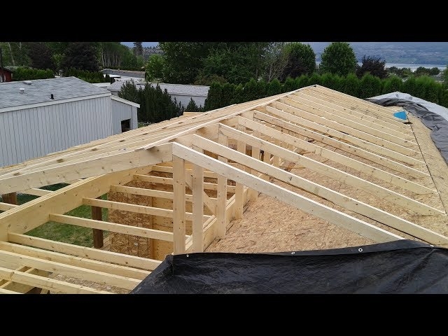 Roof Framing Addition with Exposed Trusses and OSB Sheathing