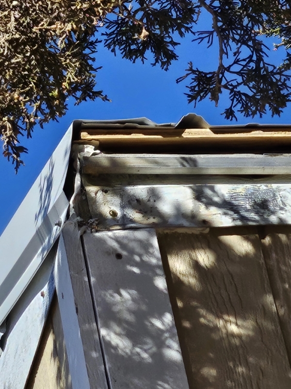 Roofing Detail Showing Metal Flashing and Wood Substructure Layers
