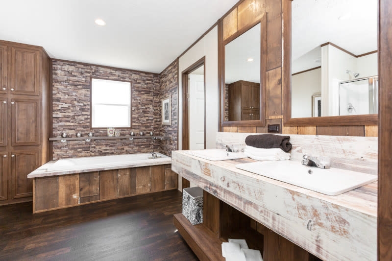 Rustic Bathroom: Stone Accent Wall & Whitewashed Double Vanity