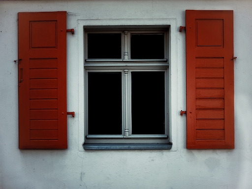 Rustic Orange-Red Board and Batten Exterior Shutters for Farmhouse